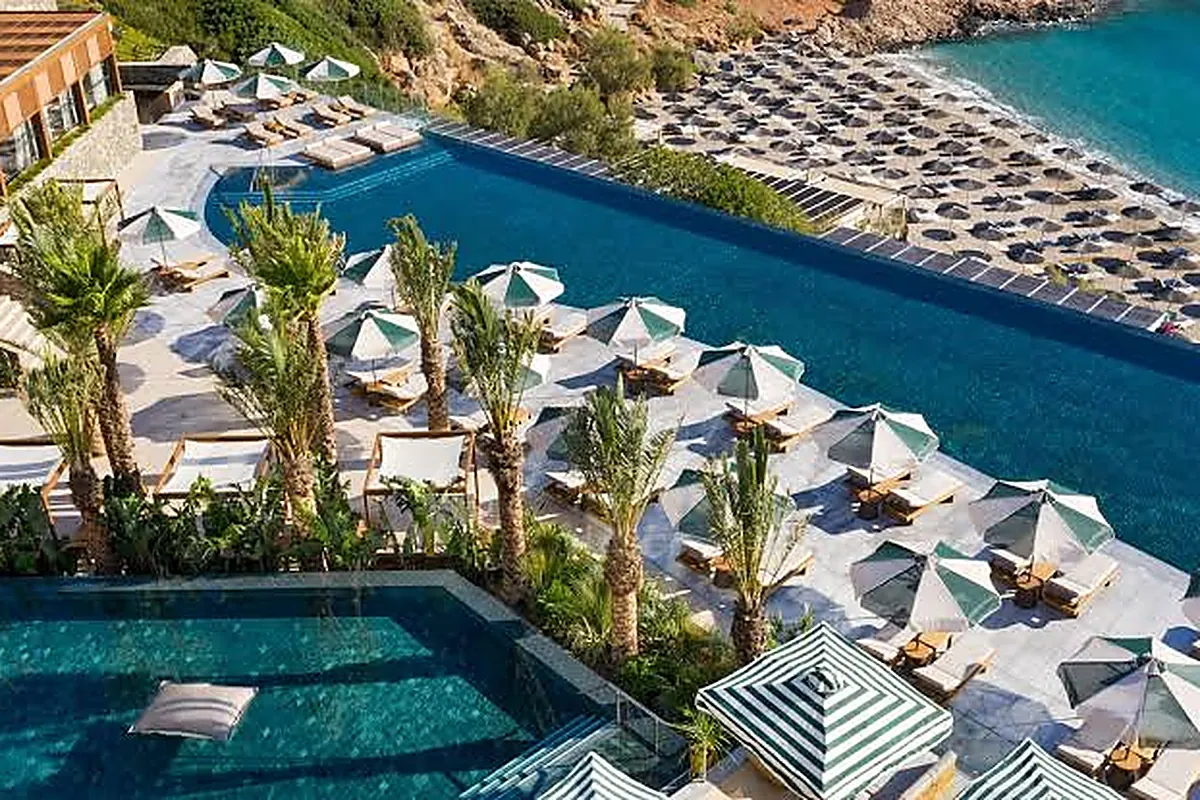 Terraced resort above a private sandy cove in eastern Crete