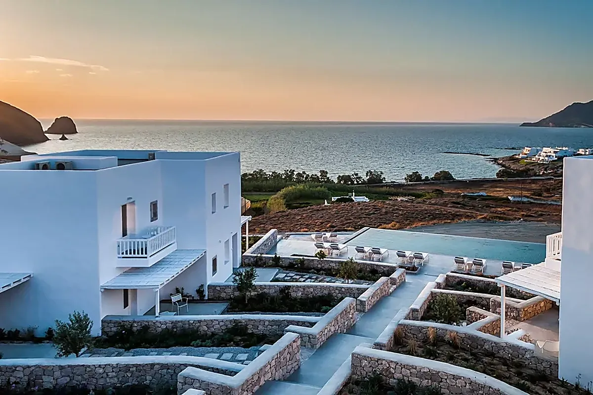 Sea view hotel terrace above Pollonia bay on Milos at sunset
