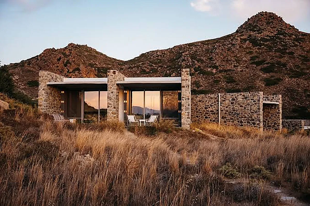 Minimal stone lodge with a private terrace overlooking the Aegean on Milos