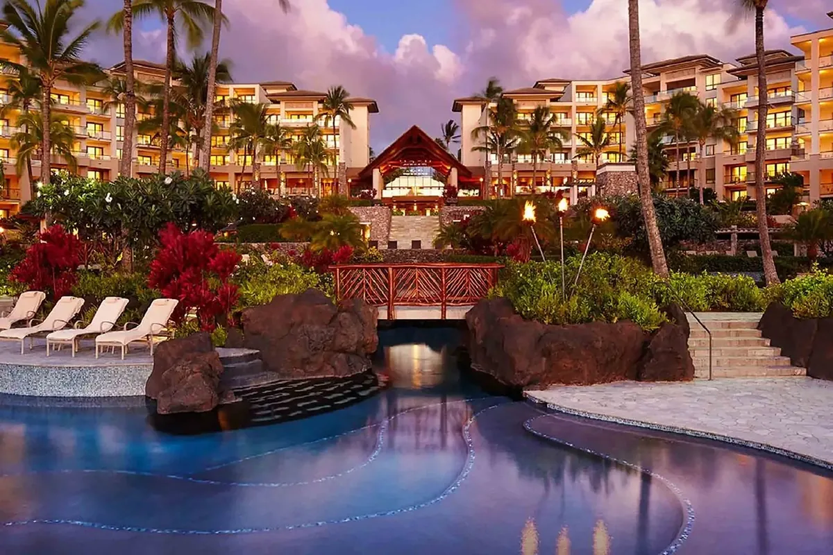Wide residential suite lanai overlooking the turquoise water of Kapalua Bay in Maui